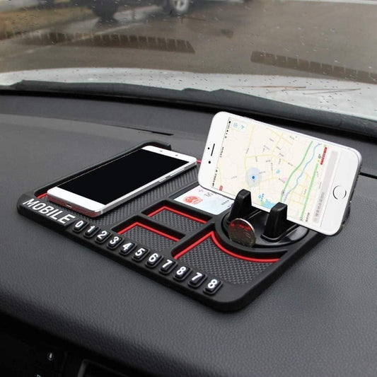 Car dashboard organizer with phone holder and number plate holder on a car dashboard.
